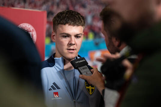 Emil Holm of Sweden in mixed zone