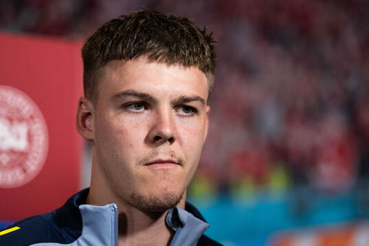 Emil Holm of Sweden in mixed zone