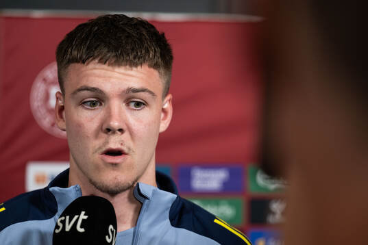 Emil Holm of Sweden in mixed zone