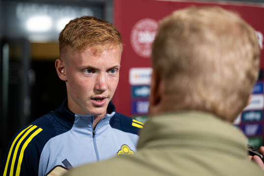 Hugo Larsson of Sweden in mixed zone