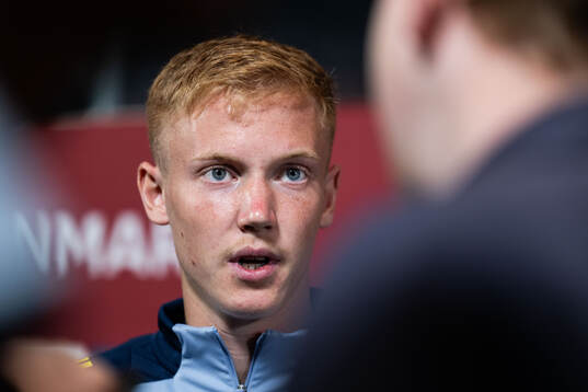 Hugo Larsson of Sweden in mixed zone