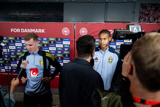 Emil Krafth and Jens Cajuste of Sweden in mixed zone