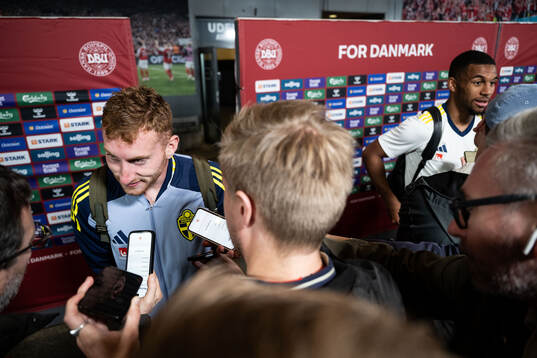 Dejan Kulusevski and Isak Hien of Sweden in mixed zone