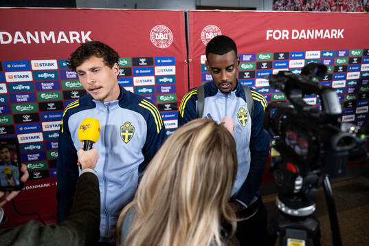Victor Nilsson Lindelöf and Alexander Isak of Sweden in