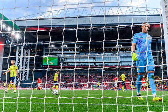 Goalkeeper Robin Olsen of Sweden looks dejected