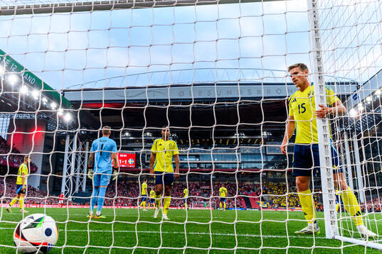 Carl Starfelt of Sweden looks dejected
