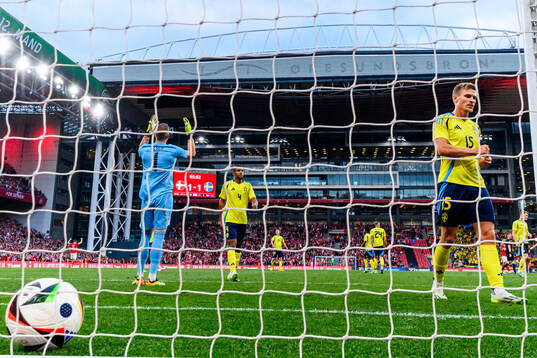 Carl Starfelt of Sweden looks dejected