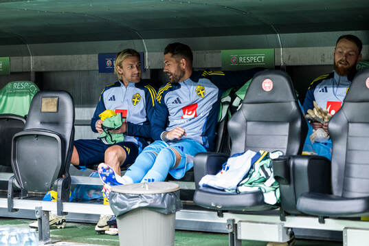 Emil Forsberg and goalkeeper Kristoffer Nordfeldt of Sweden
