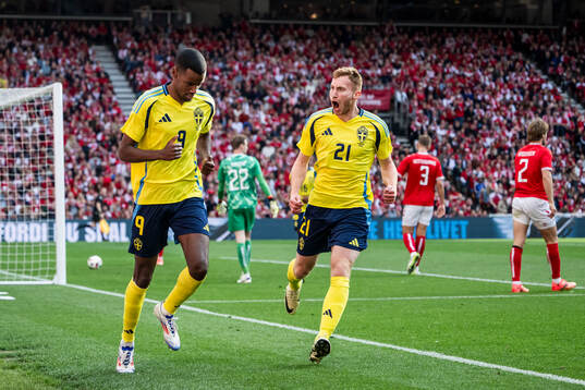 Alexander Isak and Dejan Kulusevski of Sweden celebrate