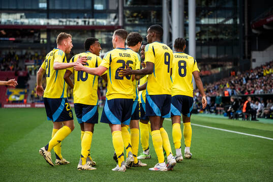 Players of Sweden celebrate