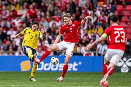Victor Nilsson Lindelöf of Sweden and Rasmus Højlund of
