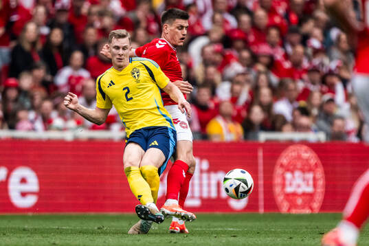 Emil Krafth of Sweden and Joakim Mæhle of Denmark