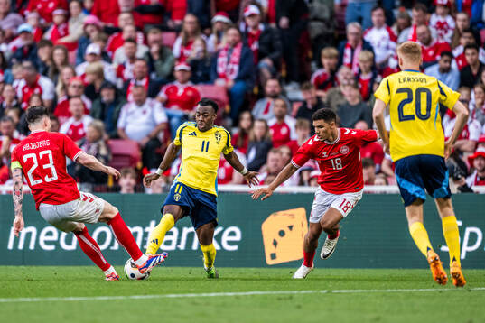 Pierre-Emile Højbjerg of Denmark and Anthony Elanga of