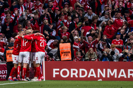 Christian Eriksen of Denmark celebrates