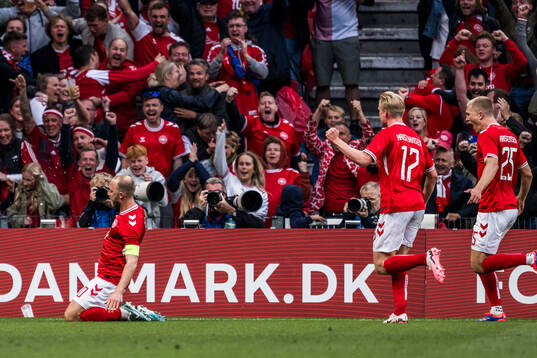 Christian Eriksen of Denmark celebrates