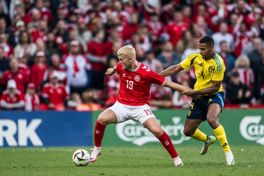 Jonas Wind of Denmark and Isak Hien of Sweden