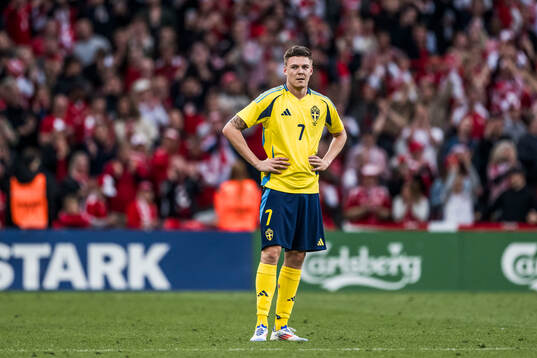 Emil Holm of Sweden looks dejected