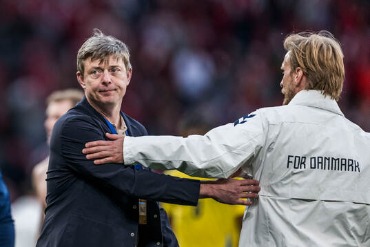 Head coach Jon Dahl Tomasson of Sweden looks dejected