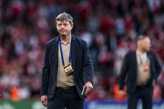 Head coach Jon Dahl Tomasson of Sweden looks dejected