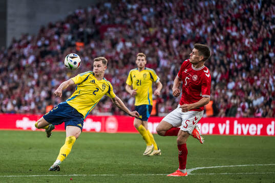 Emil Krafth of Sweden and Joakim Mæhle of Denmark