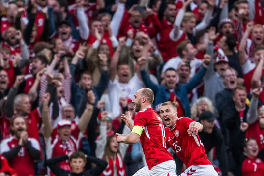 Christian Eriksen and Samuel Dahl of Denmark celebrate the