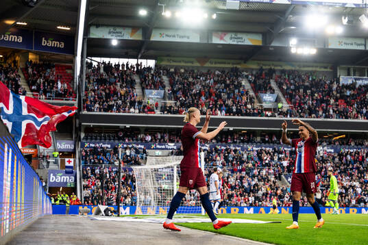 Erling Braut Haaland of Norway celebrates with Antonio Nusa