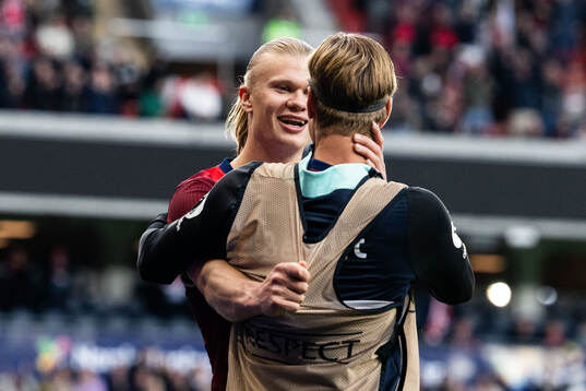 Erling Braut Haaland of Norway celebrates with Erik Botheim