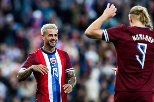 Aron Dønnum and Erling Braut Haaland of Norway celebrate