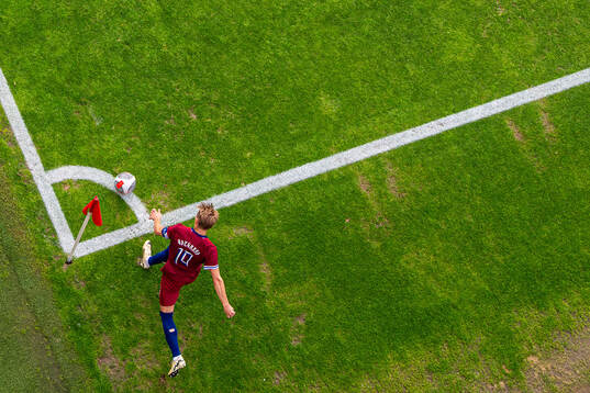Martin Ødegaard of Norway takes a corner kick
