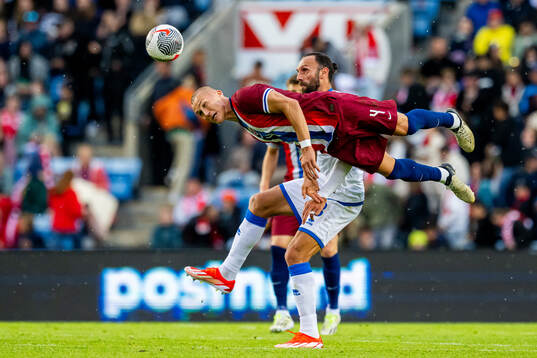 Leo Østigård of Norway and Vedat Muriqi of Kosovo
