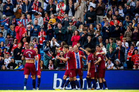 Erling Braut Haaland of Norway celebrates with Sander