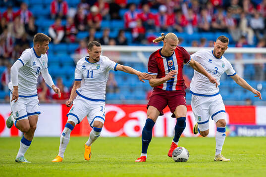 Erling Braut Haaland of Norway in action against Lindon