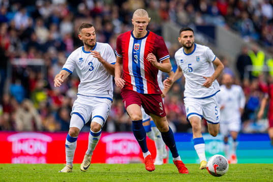 Fidan Aliti of Kosovo and Erling Braut Haaland of Norway