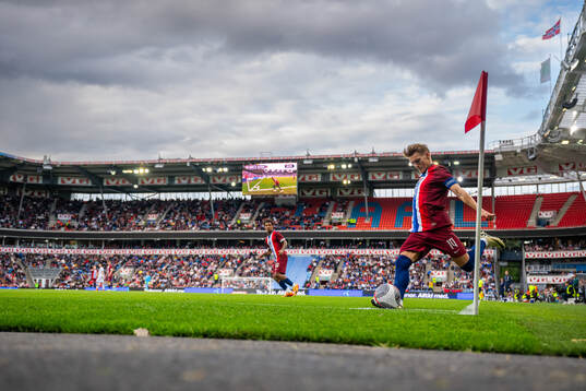 Martin Ødegaard of Norway takes a corner kick