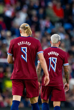 Erling Braut Haaland of Norway with teammate Aron Dønnum