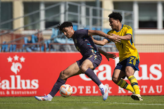 Ben Chrisene of England and Momodou Sonko of Sweden