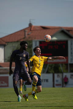 Abu Kamara of England and Noah Persson of Sweden