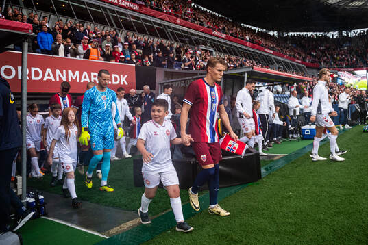 Martin Ødegaard and goalkeeper Ørjan Håskjold Nyland of
