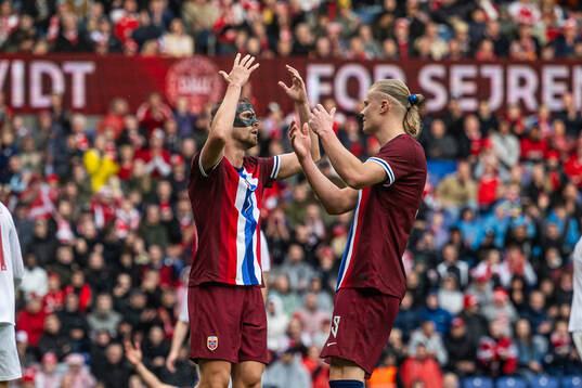 Kristoffer Ajer and Erling Braut Haaland look dejected