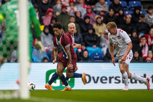 Oscar Bobb of Norway and Victor Kristiansen of Denmark