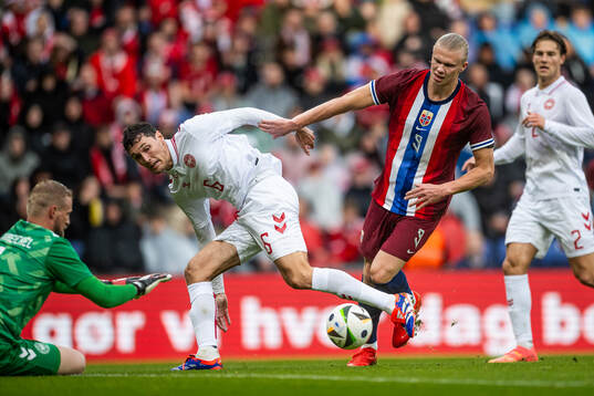 Andreas Christensen of Denmark and Erling Braut Haaland of