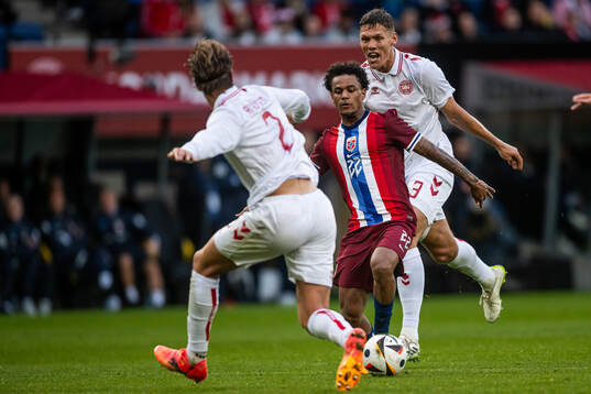 Oscar Bobb of Norway and Jannik Vestergaard of Denmark