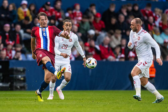 Sander Berge of Norway and Yussuf Poulsen and Christian