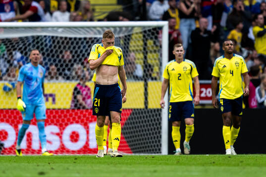 Dejan Kulusevski of Sweden looks dejected