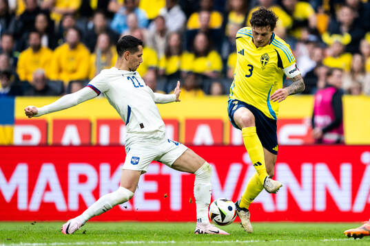 Uros Spajic of Serbia and Victor Nilsson Lindelöf of Sweden