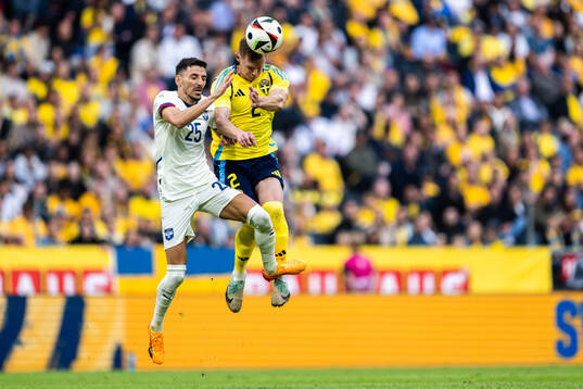 Filip Mladenovic of Serbia and Emil Krafth of Sweden