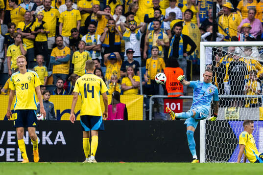 Robin Olsen of Sweden looks dejected