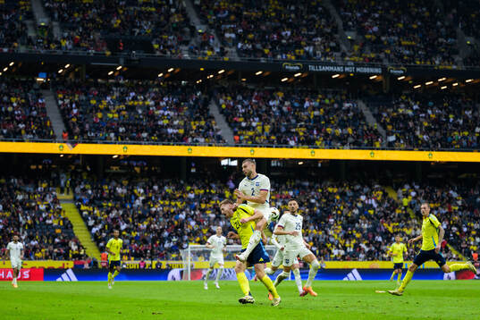 Dejan Kulusevski of Sweden and Strahinja Pavlovic of Serbia