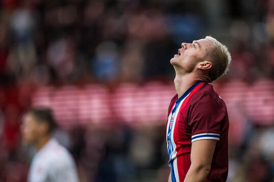 Julian Ryerson of Norway looks dejected