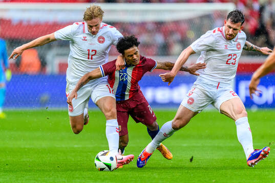 Victor Kristiansen and Pierre-Emilie Højbjerg of Denmark